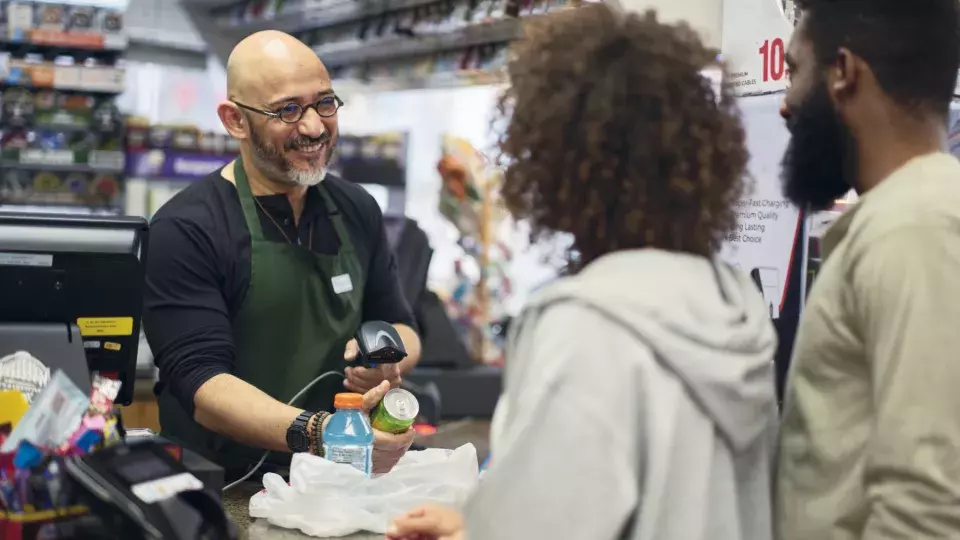 Customers at a check out counter